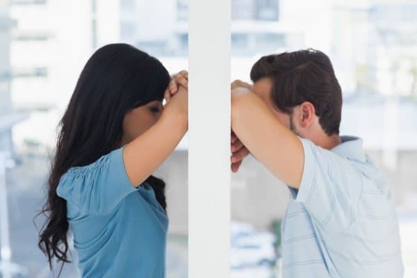 depositphotos_28050367-stock-photo-depressed-couple-divided